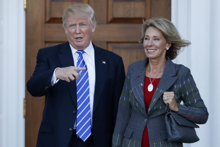 President Donald Trump with Secretary of Education Betsy Devos