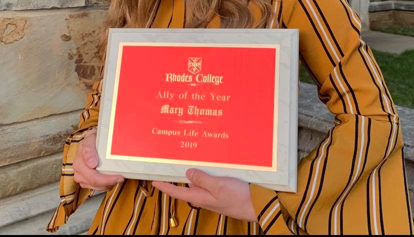 Mary+Thomas+holds+Ally+of+the+Year+award+immediately+after+the+Campus+Life+Awards.